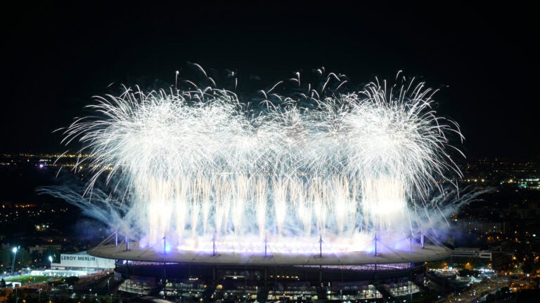 Fireworks signal the end of the 2024 Summer Olympics closing ceremony taking place at the Stade de France.