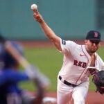 Red Sox starter Kutter Crawford delivers during the first inning against the Texas Rangers, Tuesday, Aug. 13, 2024, in Boston.
