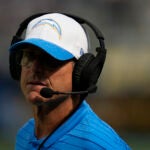 Los Angeles Chargers head coach Jim Harbaugh during the first half of a preseason NFL football game against the Seattle Seahawks.