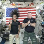 In this image from video provided by NASA, astronauts Suni Williams, left, and Butch Wilmore give a news conference aboard the International Space Station on Wednesday, July 10, 2024.