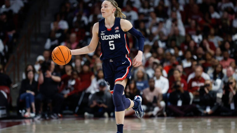 UConn guard Paige Bueckers brings the ball up court during the second half of an NCAA college basketball game against South Carolina in Columbia.