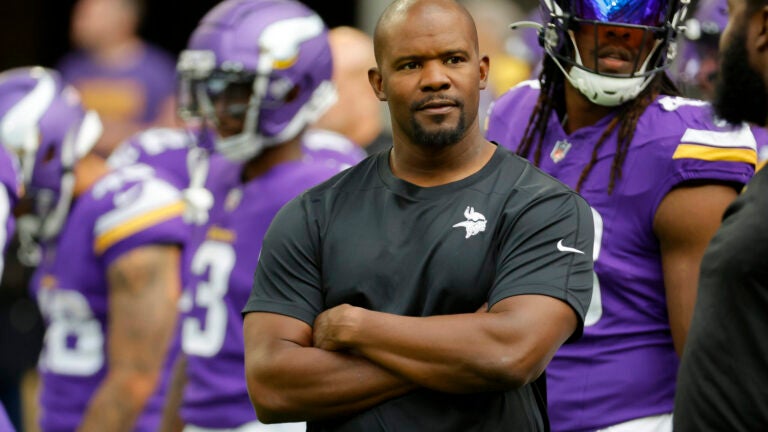 Minnesota Vikings defensive coordinator Brian Flores watches his players prior to an NFL preseason football game against the Arizona Cardinals, Aug. 26, 2023, in Minneapolis. Flores still has a pit in his stomach when he thinks about the Khyree Jackson and the car crash that took the rookie cornerbacks' life earlier this month. The Vikings defensive coordinator was not only enamored by Jackson's potential but by the unconventional path he took to the NFL.