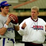 New England Patriots quarterback Drew Bledsoe gets some advice from coach Bill Parcells during practice in New Orleans, Wednesday, Jan. 22, 1997. The Patriots face the Green Bay Packers in this Sunday's Super Bowl XXXI.