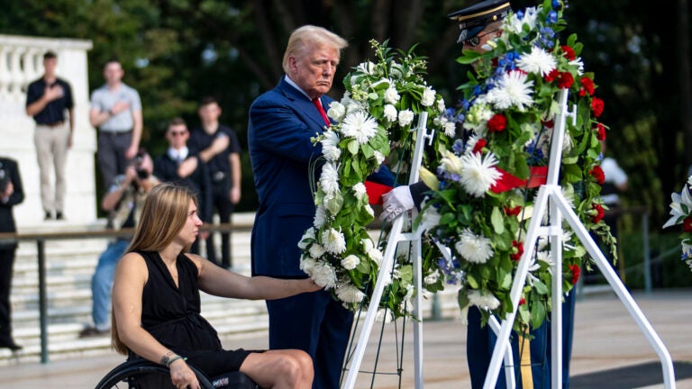 Former President Donald Trump attends a wreath-laying ceremony at Arlington National Cemetery in Virginia.