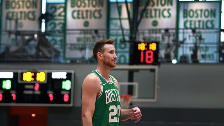 Gordon Hayward is pictured as he walks across the floor following a photo shoot.