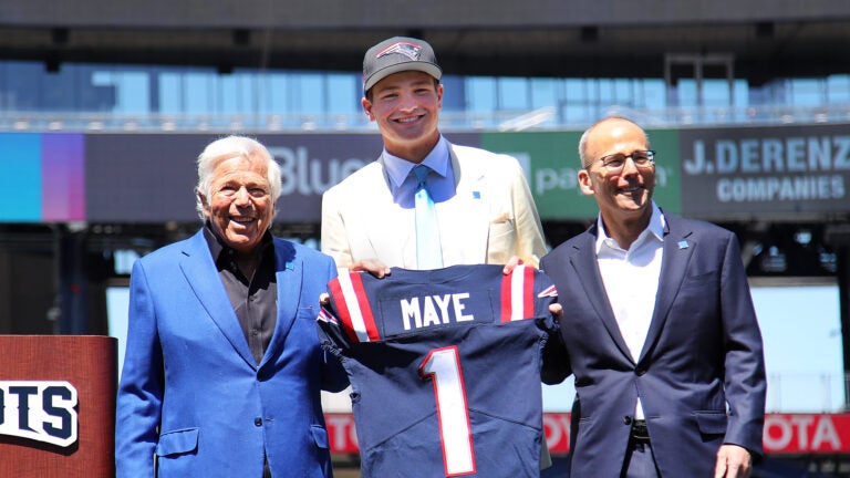 The New England Patriots introduced their new number 1 draft choice, qb Drake Maye to the media on the field at Gillette Stadium. He was escorted on to the field by Robert and Jonathan Kraft(rt) who presented him with his jersey.