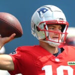 The NE Patriots held training camp at Gillette Stadium. Qb Drake Maye makes a pass.