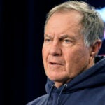 Bill Belichick speaks with reporters in Foxborough in October 2021.