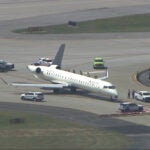 A plane sits damaged at Hartsfield-Jackson Atlanta International Airport after colliding with another plane on a taxiway, Tuesday, Sept. 10, 2024.