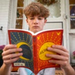 Chris Stanislawski, 14, poses for a portrait outside of his home in Garden City, N.Y.