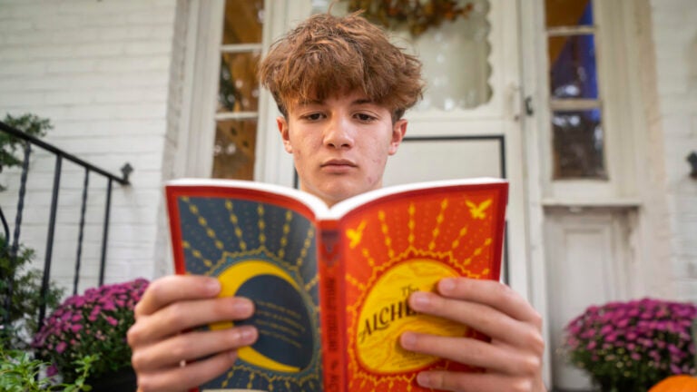 Chris Stanislawski, 14, poses for a portrait outside of his home in Garden City, N.Y.