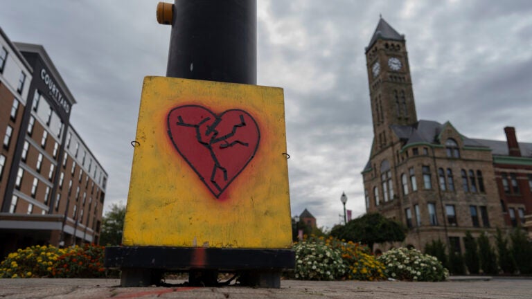 An image of a broken heart is fixed across the street from City Hall with the Heritage Center of Clark County.