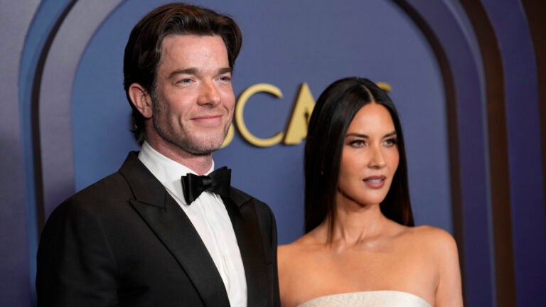 John Mulaney, left, and Olivia Munn arrive at the Governors Awards.