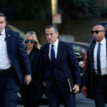 Hunter Biden, center, and his wife Melissa Cohen Biden, arrive in federal court for jury selection for his trial on felony tax charges Thursday, Sept. 5, 2024, in Los Angeles.