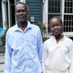 Ayuen Leet (right) and her father Mayak Leet Jok. Leet, 13, was seriously injured when she was hit by a vehicle while crossing Shrewsbury Street in Worcester on July 29.