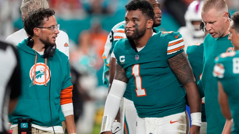 Dolphins coach Mike McDaniels spoke with forward Tua Tagovailoa, who left the game after suffering a concussion during the team's win over the Bills.