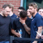 Blue Jackets' Cole Sillinger reacts during the candlelight vigil to honor Johnny and Matthew Gaudreau.