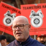 Sean O'Brien, General President, International Brotherhood of Teamsters, speaks to media as picketing rail workers gather at the CPKC headquarters in Calgary, Alta., Friday, Aug. 23, 2024.