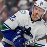 Vancouver Canucks center Elias Lindholm (23) in the third period of an NHL hockey game Tuesday, Feb. 20, 2024, in Denver.