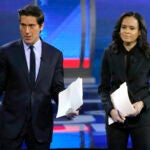 ABC World News Tonight Anchor David Muir, left, addresses members of the audience while standing with ABC News Live Anchor Linsey Davis, Friday, Feb. 7, 2020 in Manchester, N.H.