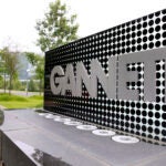 FILE - In this July 14, 2010 file photo, he sign for Gannett headquarters is displayed in McLean, Virginia.