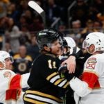 BOSTON, MASSACHUSETTS - MAY 17: Trent Frederic #11 of the Boston Bruins fights with Sam Bennett #9 of the Florida Panthers during the third period in Game Six of the Second Round of the 2024 Stanley Cup Playoffs at TD Garden on May 17, 2024 in Boston, Massachusetts.