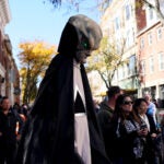 An extraterrestrial wanders the streets of Salem before Halloween.