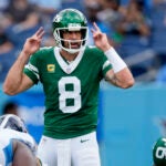 New York Jets quarterback Aaron Rodgers (8) calls a play during the second half of an NFL football game against the Tennessee Titans, Sunday, Sept. 15, 2024, in Nashville, Tenn.