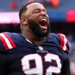 FOXBOROUGH, MASSACHUSETTS - OCTOBER 22: New England Patriots defensive tackle Davon Godchaux #92 celebrates after defeating the Buffalo Bills at Gillette Stadium on October 22, 2023 in Foxborough, Massachusetts.