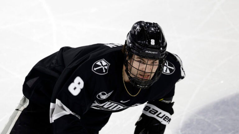 Providence forward Riley Duran (8) skates during the second period of an NCAA hockey game against Northeastern on Saturday, Nov. 11, 2023, in Boston.