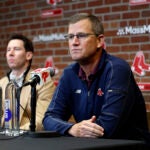 Sam Kennedy, president and CEO of the Boston Red Sox, Craig Breslow, chief baseball officer, and Alex Cora, team manager, sit during the end-of-season press conference at Fenway Park.