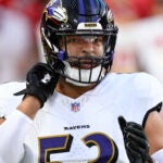 Kyle Van Noy takes part in drills before a game against the Chiefs.