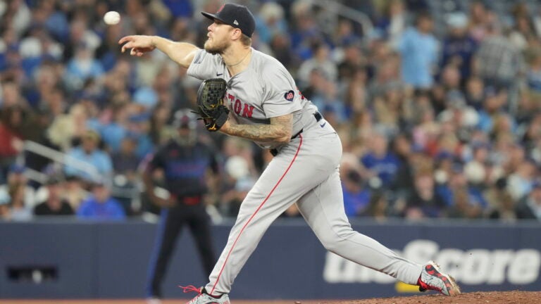 Tanner Houck works against the Blue Jays during a baseball game in Toronto.