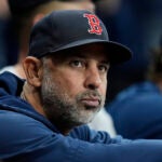 Boston Red Sox manager Alex Cora watches against the Tampa Bay Rays during the first inning of a baseball game Wednesday, Sept. 18, 2024, in St. Petersburg, Fla.