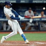 Tampa Bay Rays' Jose Siri connects for a three-run double off Boston Red Sox relief pitcher Josh Winckowski during the eighth inning.