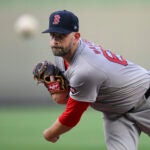 Boston Red Sox starting pitcher James Paxton throws during the first inning of a baseball game against the Kansas City Royals, Monday, Aug. 5, 2024, in Kansas City, Mo.
