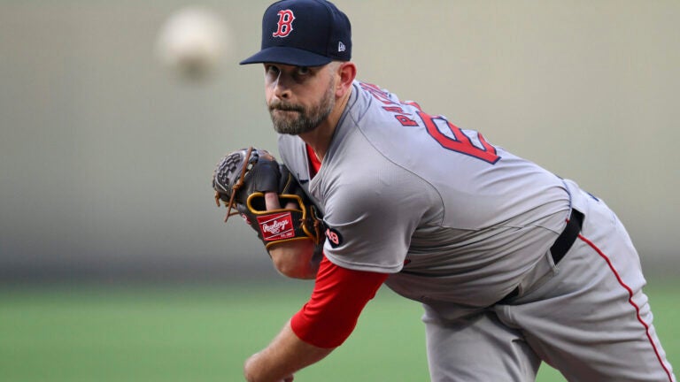 Boston Red Sox starting pitcher James Paxton throws during the first inning of a baseball game against the Kansas City Royals, Monday, Aug. 5, 2024, in Kansas City, Mo.