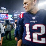 New England Patriots head coach Bill Belichick and quarterback Tom Brady after Belichick picked up his 300 career win defeating the Cleveland Browns 27-13 at Gillette Stadium.