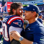 Seattle Seahawks head coach Mike Macdonald greets New England Patriots center David Andrews (60) after an NFL football game on Sunday, Sept. 15, 2024, in Foxborough, Mass. The Seattle Seahawks defeated the New England Patriots 23-20. (AP Photo/Greg M. Cooper)