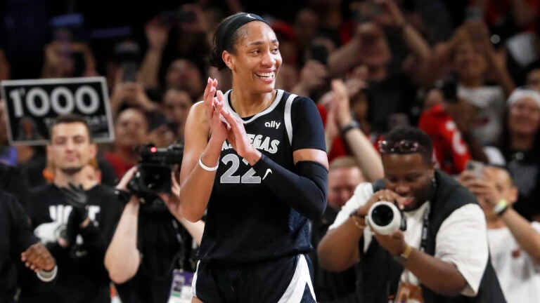 A'ja Wilson celebrates during an Aces game against the Sun.