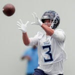 Tennessee Titans cornerback Caleb Farley (3) makes a catch during NFL football practice Tuesday, June 4, 2024, in Nashville, Tenn.