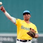 Boston Red Sox's Rafael Devers warms up before a baseball game against the Chicago White Sox, Saturday, Sept. 7, 2024, in Boston.