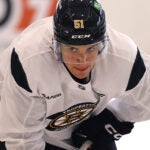 The Bruins training camp continued on Thursday at Warrior Ice Arena. Matthew Poitras takes a breather.