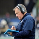 New England Patriots head coach Bill Belichick working with a tablet on the sidelines during second quarter action agaisnt the Buffalo Bills at Gillette Stadium on Sunday October 1, 2016.
