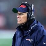 New England Patriots offensive line coach Dante Scarnecchia watches from the sideline in the first half of an NFL wild-card playoff football game against the Tennessee Titans, Saturday, Jan. 4, 2020, in Foxborough, Mass.