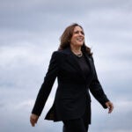 Vice President Kamala Harris, the Democratic presidential nominee, boards Air Force Two.