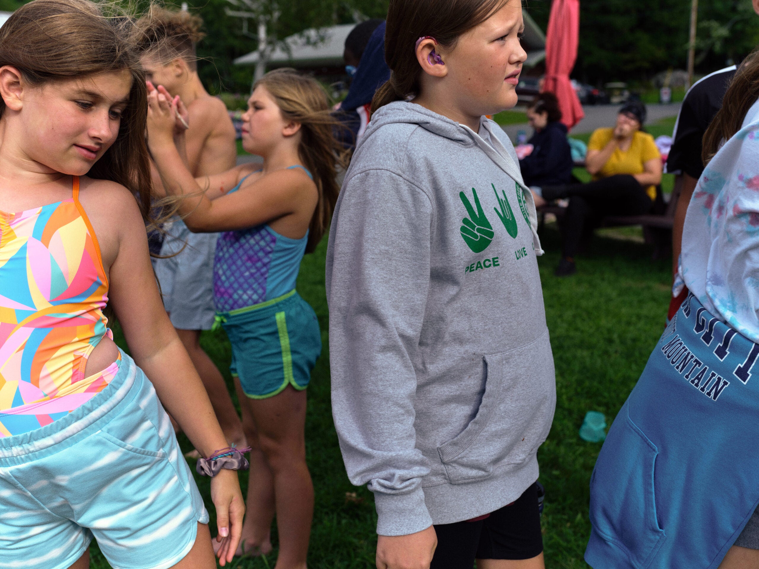 Campers wait to dive into the pond during Pine Creek Camp's Dirigo Experience.