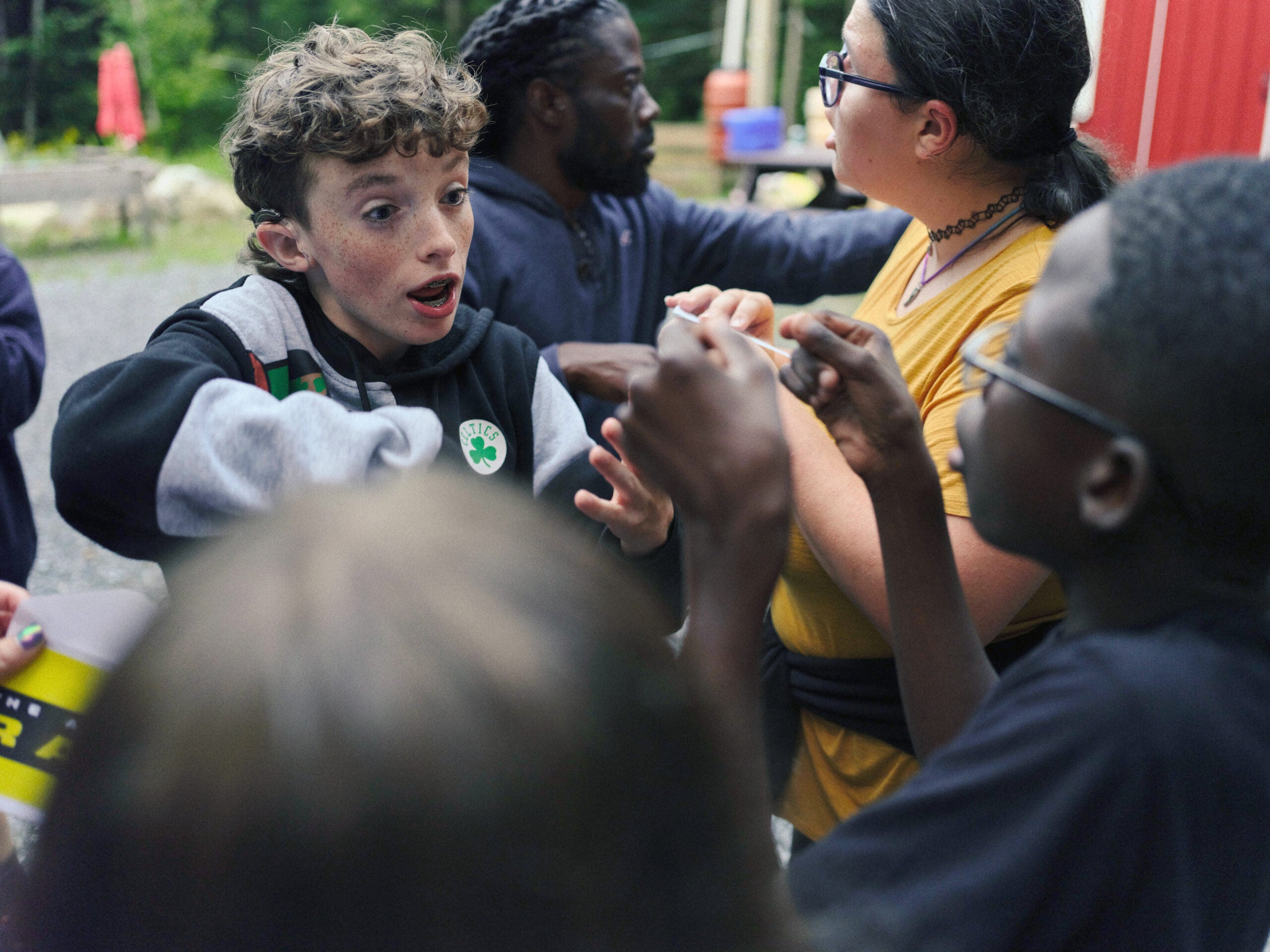 Fionn McLaughlin with others at Pine Creek Camp's Dirigo Experience. 