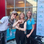 Matt Shultz and his wife, Eva, with their new puppy, Bowie, and New England Puppy Rescue founder Marissa Squires.