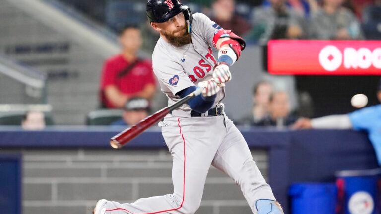 Story scores the decisive double in the 10th inning as the Red Sox beat the Blue Jays 6-5